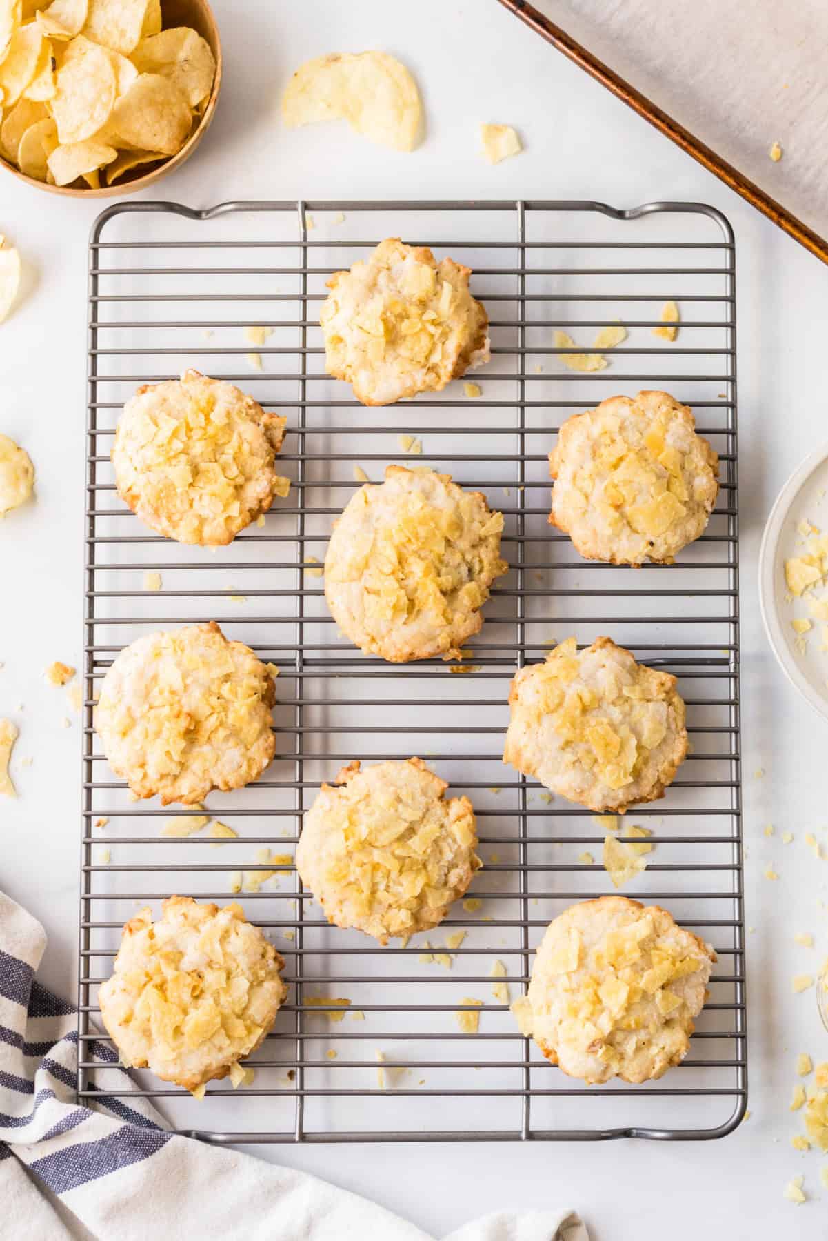 Potato Chip Cookies are sweet, salty and buttery with a unique crunch. An easy cookie recipe that everyone loves. overhead shot of potato chips cookies on cooling rack