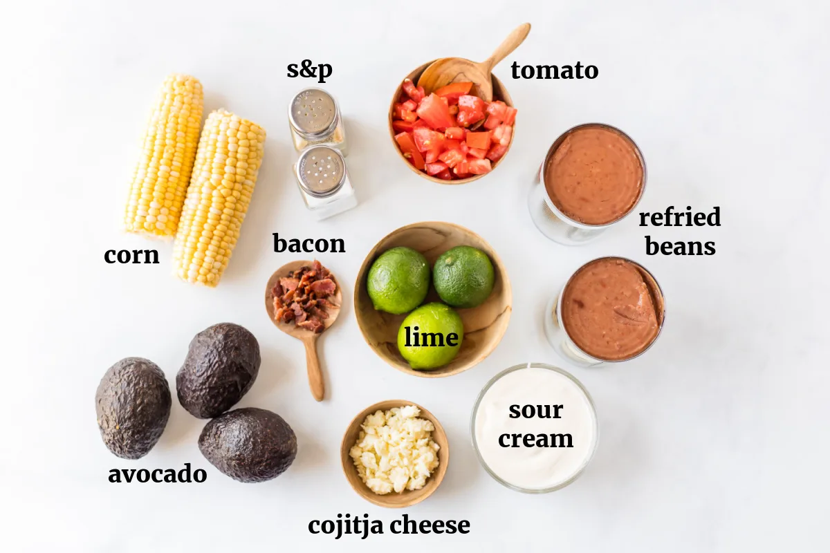7 Layer Mexican Dip recipe from RecipeBoy.com ingredients displayed for making 7 layer mexican dip recipe