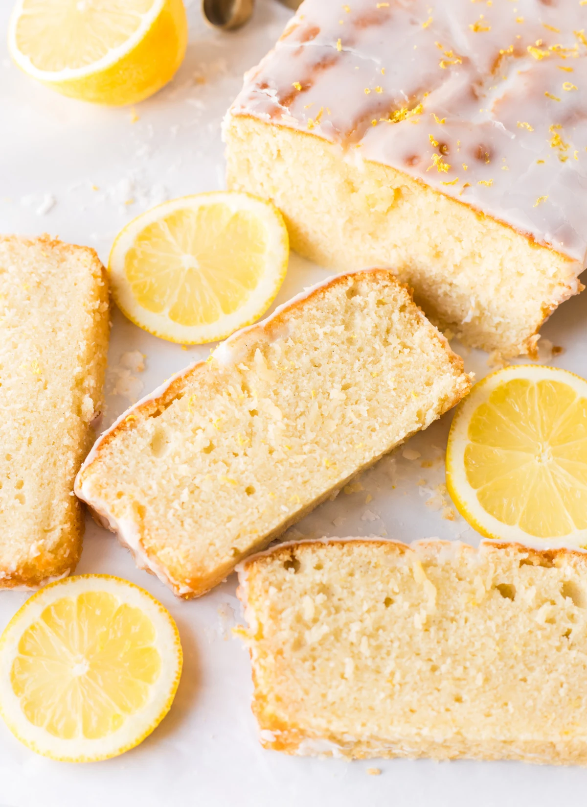 Glazed Lemon Loaf cake recipe from RecipeBoy.com glazed lemon loaf cut into slices