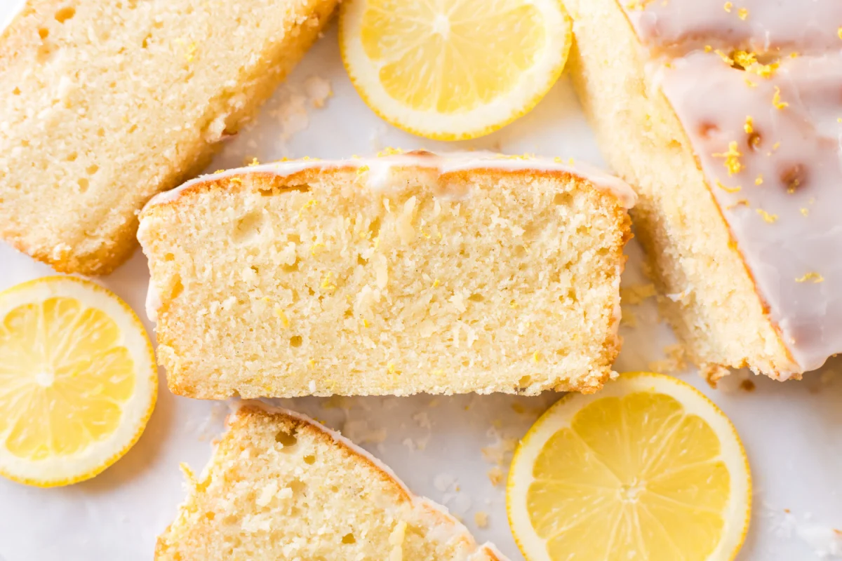 Glazed Lemon Loaf cake recipe from RecipeBoy.com lemon loaf slices and lemon slices