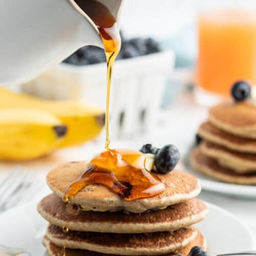 syrup pouring over stack of oatmeal blender pancakes
