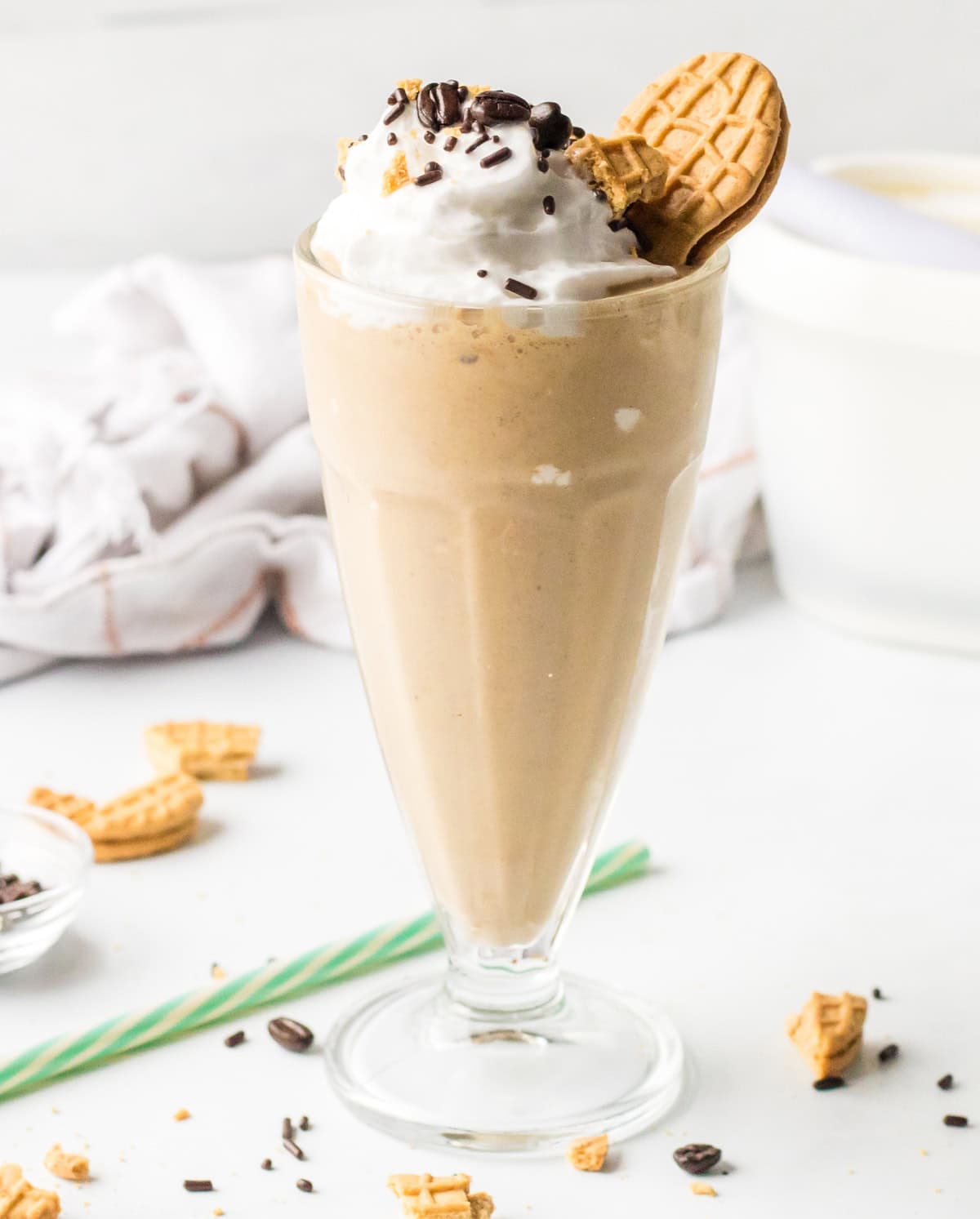 full view of coffee milkshake garnished with cookie