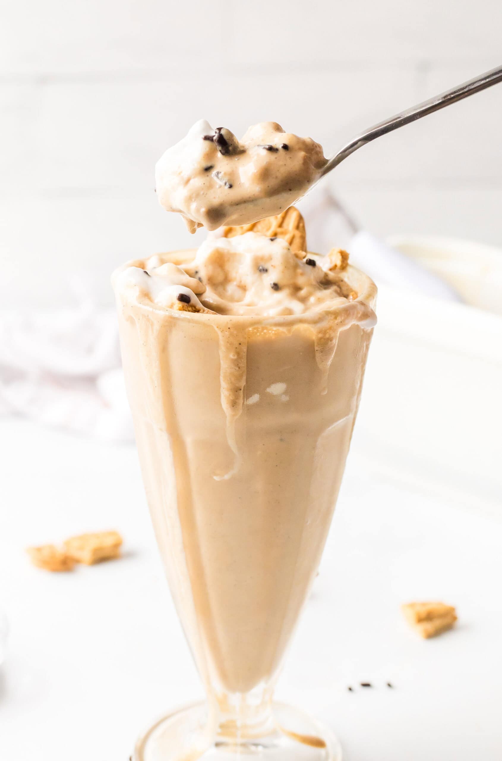 spoon taking out some of coffee milkshake