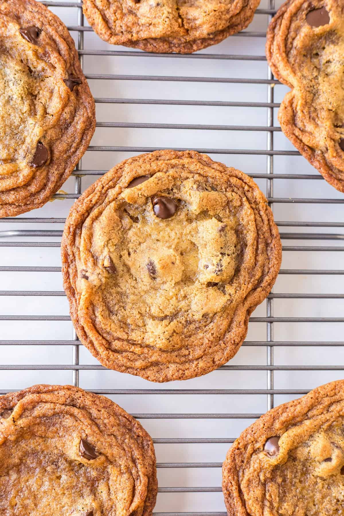 mrs fields chocolate chip cookies on a cooling rack