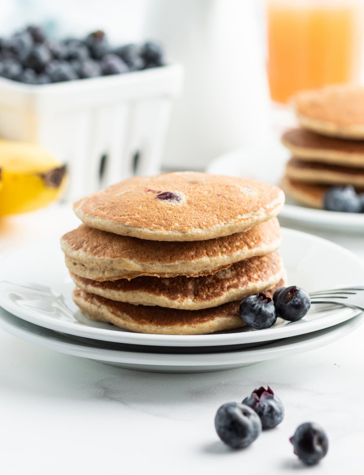 stack of oatmeal blender pancakes on plate