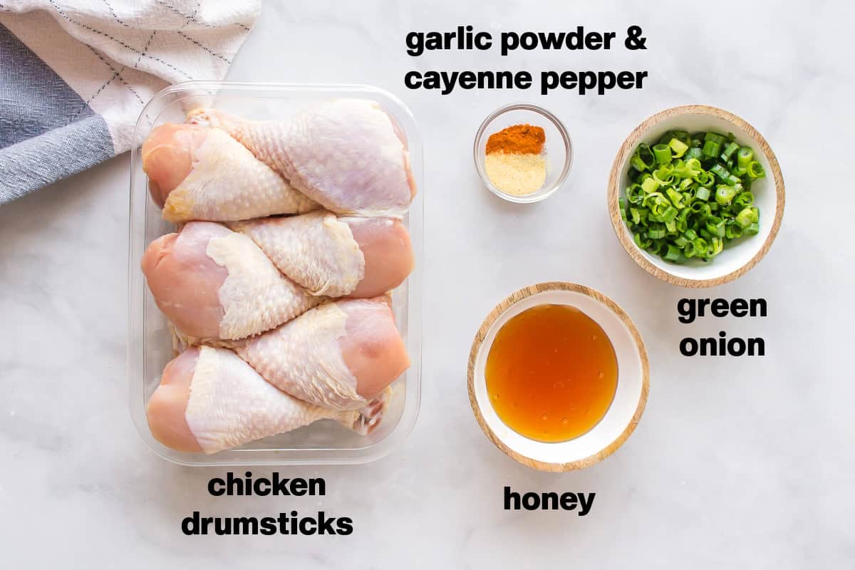 This Honey Chicken Drumsticks recipe is an easy, family friendly dinner recipe, and you will only need 5 ingredients to make it. ingredients displayed for making honey chicken drumsticks