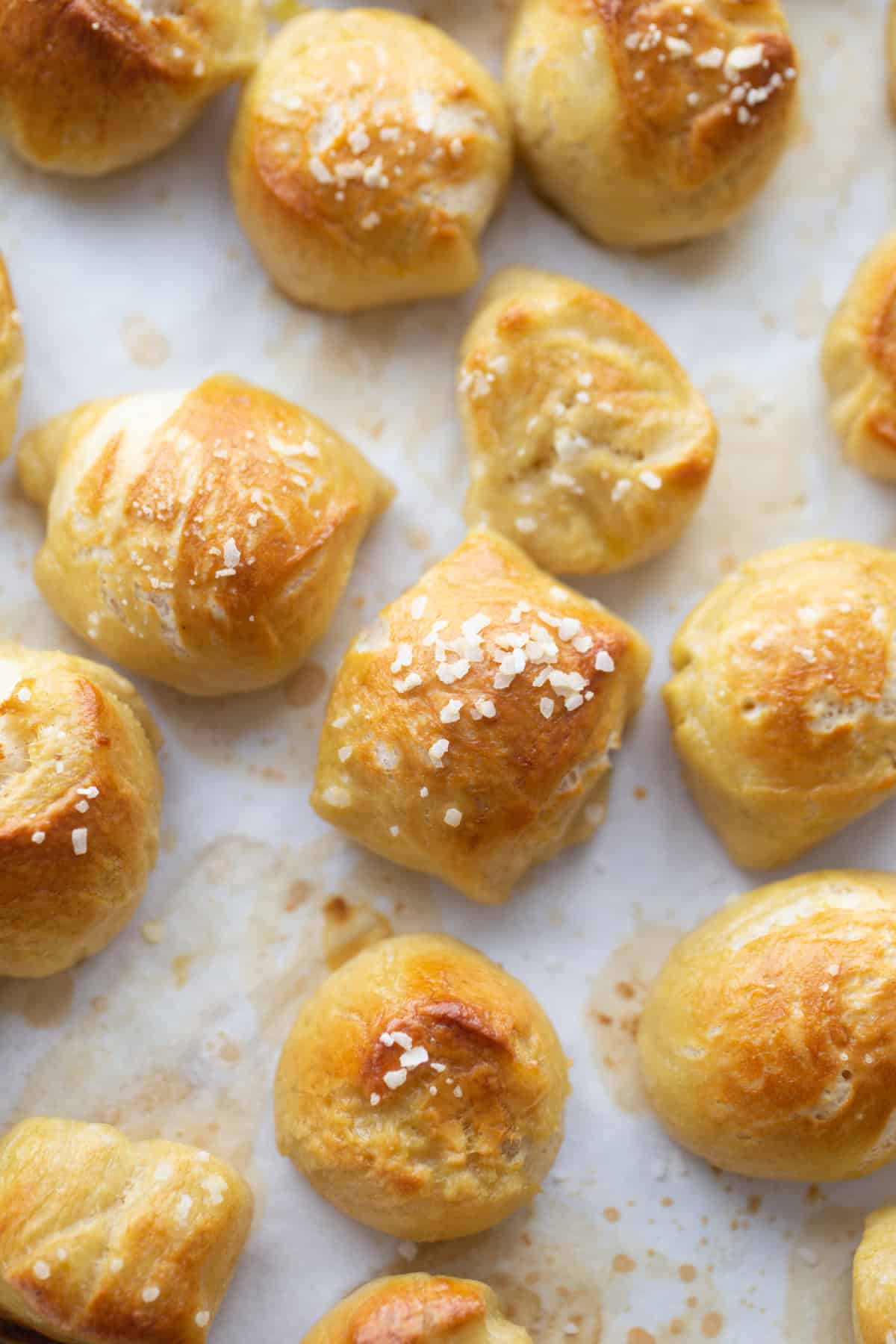 Soft Pretzel Bites with Cheese Sauce recipe from RecipeBoy.com soft pretzel bites baked on baking sheet