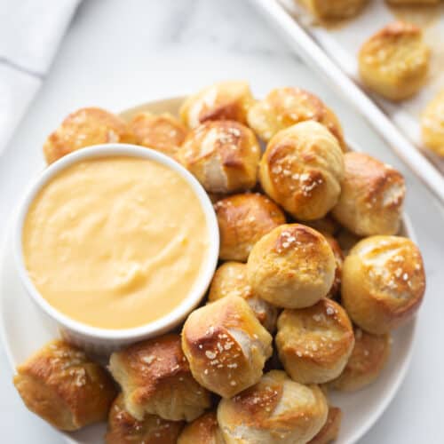 soft pretzel bites with a bowl of cheese sauce