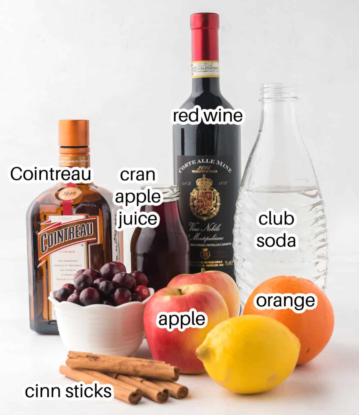 ingredients displayed for making apple cranberry sangria