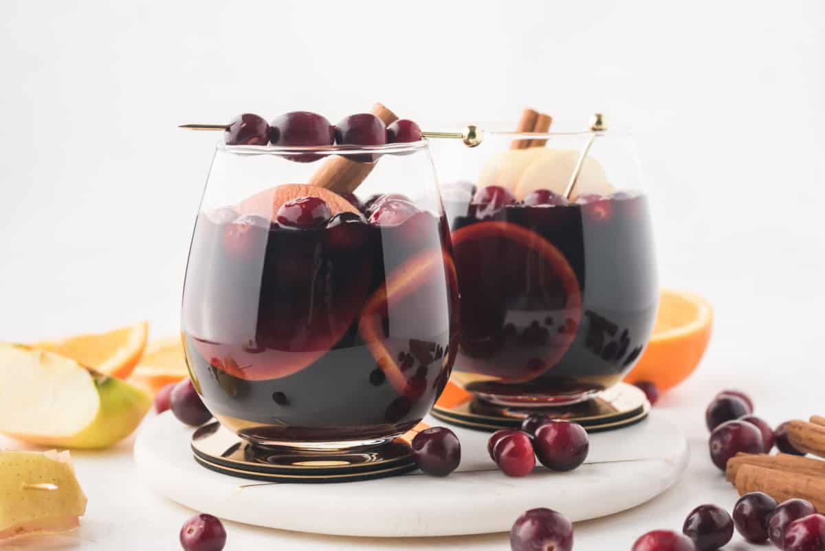 two glasses of apple cranberry sangria