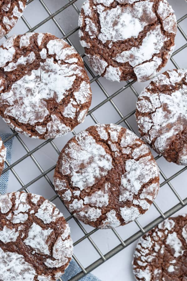 chocolate crackles cookies on a cooling rack