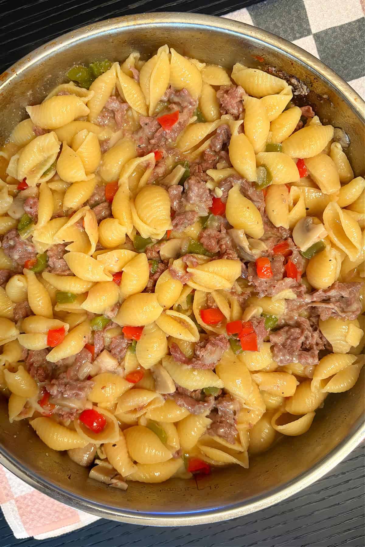 peek at philly cheesecake pasta in a skillet