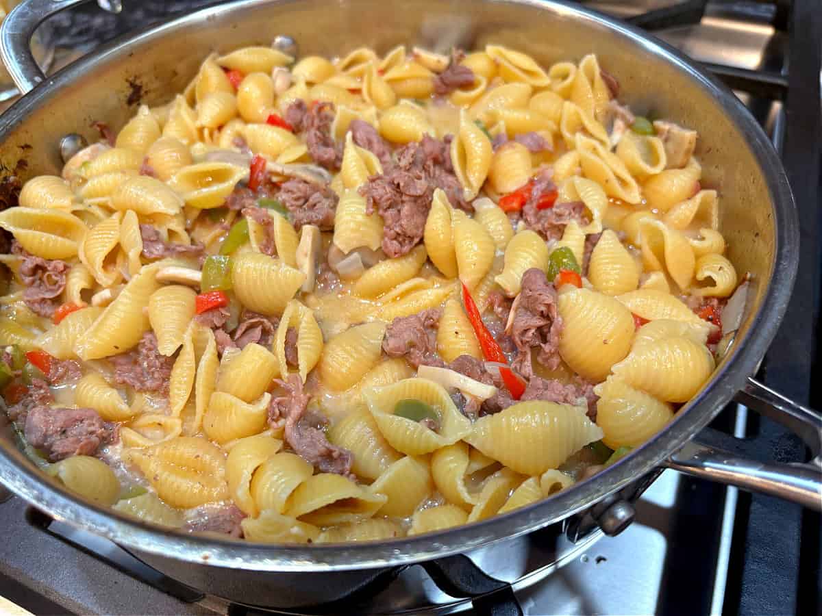 Philly Cheesesteak pasta in a skillet
