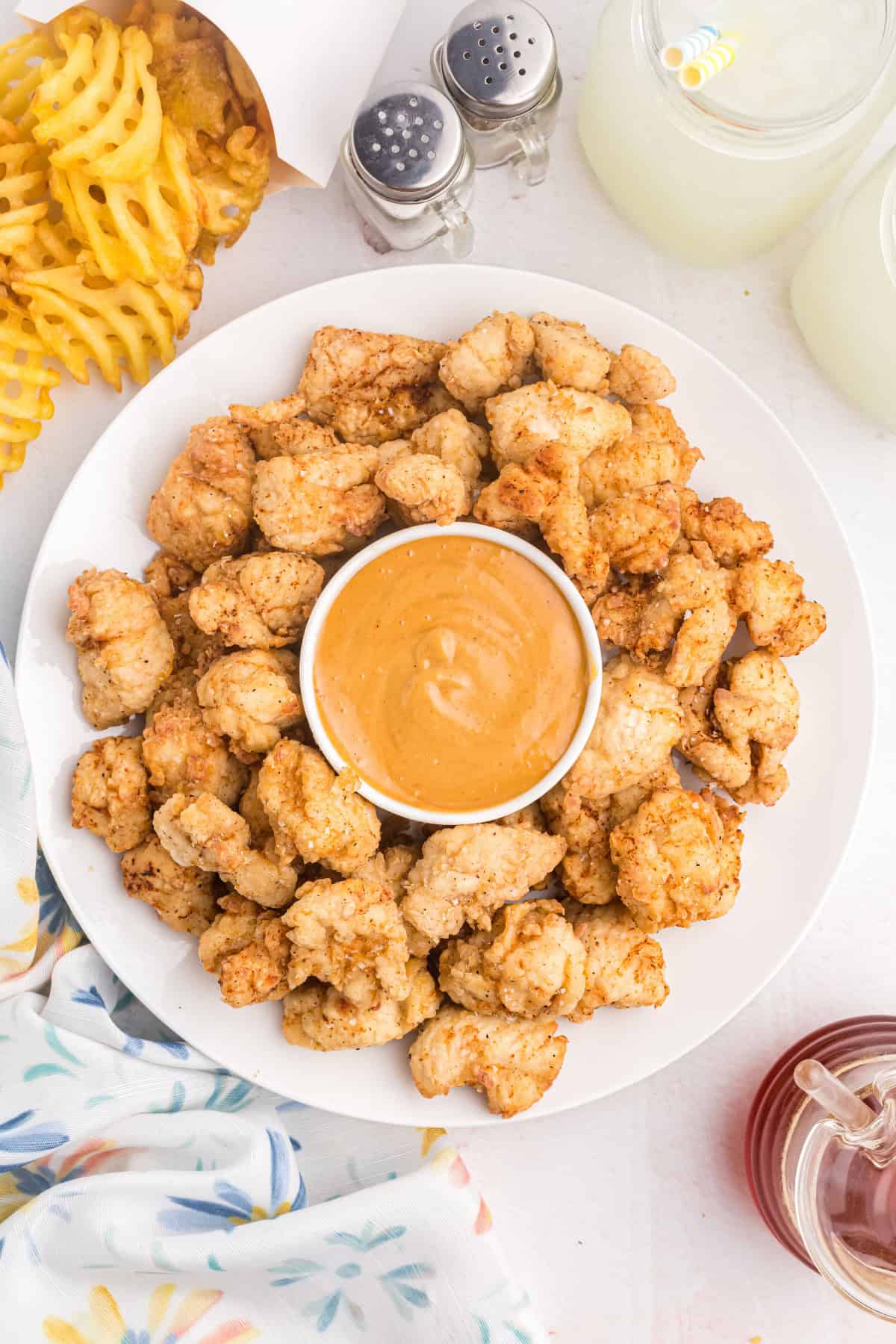 copycat chick-fil-a nuggets on platter with sauce