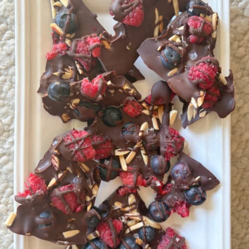 chocolate berry bark pieces on platter