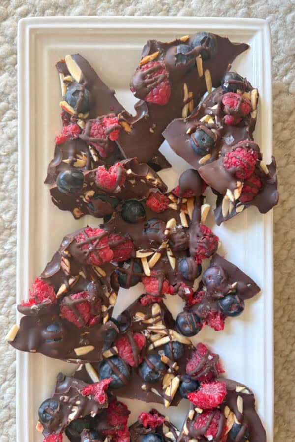 chocolate berry bark pieces on platter