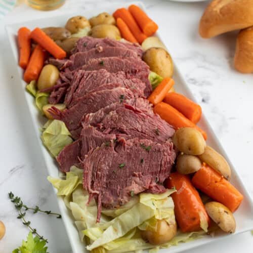 platter of slow cooked corned beef and cabbage