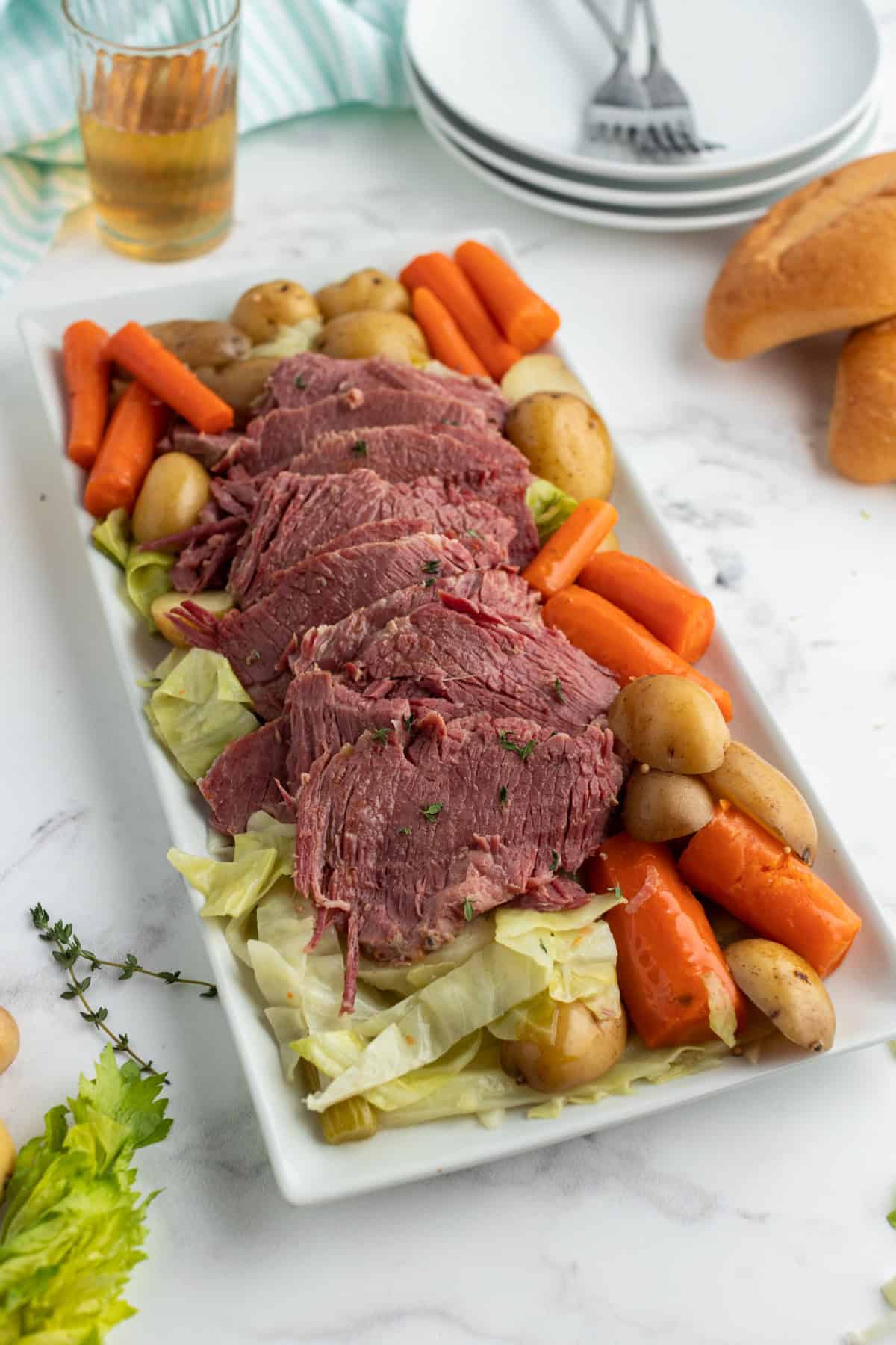 Slow Cooked Corned Beef and Cabbage is an easy, tender, and flavorful St. Patrick’s Day dinner made with brisket and hearty vegetables. platter of slow cooked corned beef and cabbage