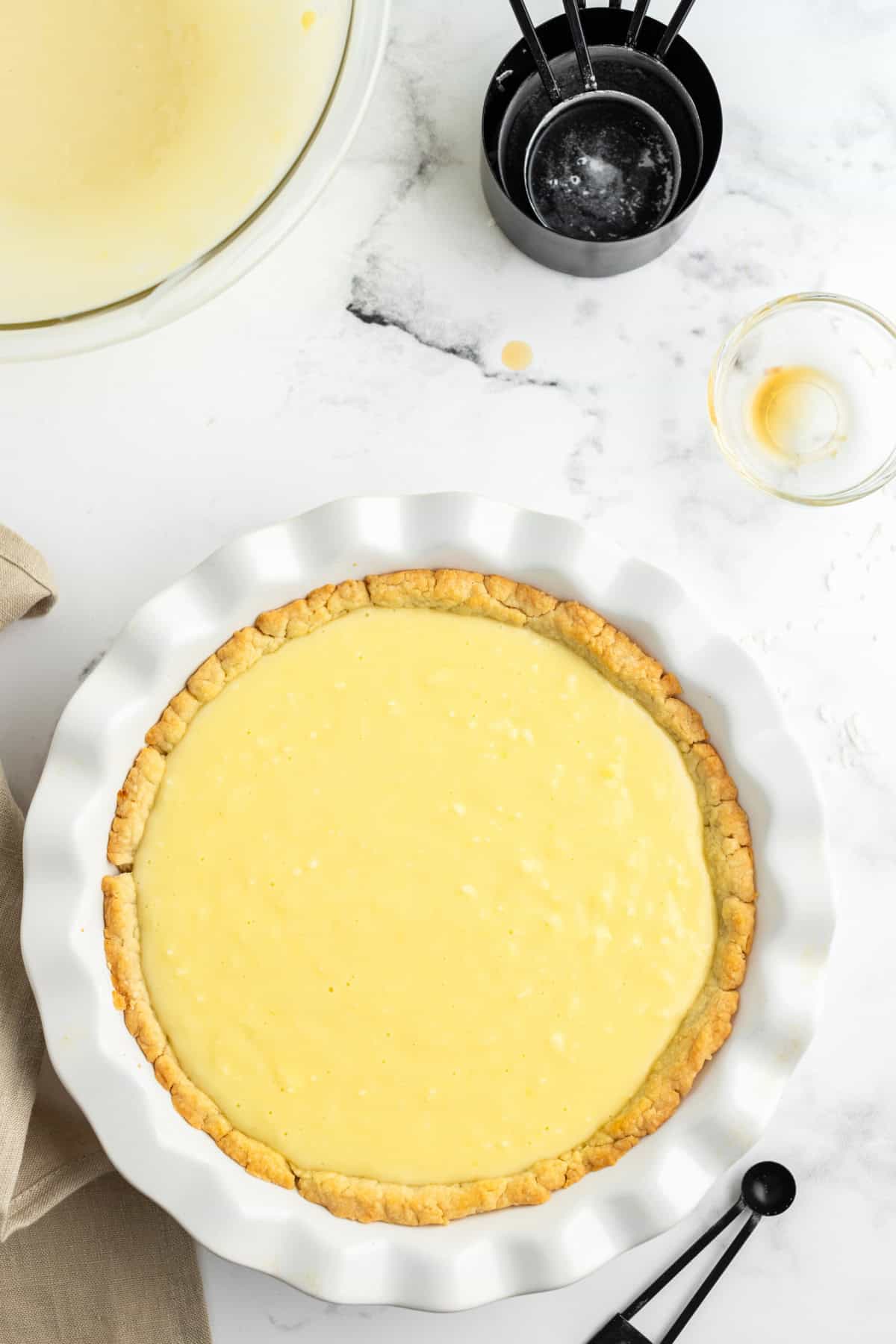 Coconut Cream Pie with a rich custard filling, whipped cream and toasted coconut. A classic homemade dessert that’s totally worth it. coconut cream pie filling