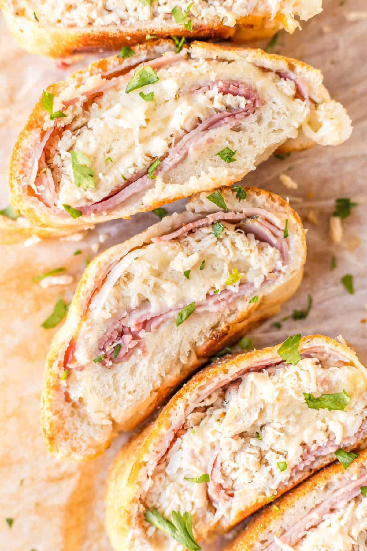 overhead shot of slices of chicken cordon bleu stromboli